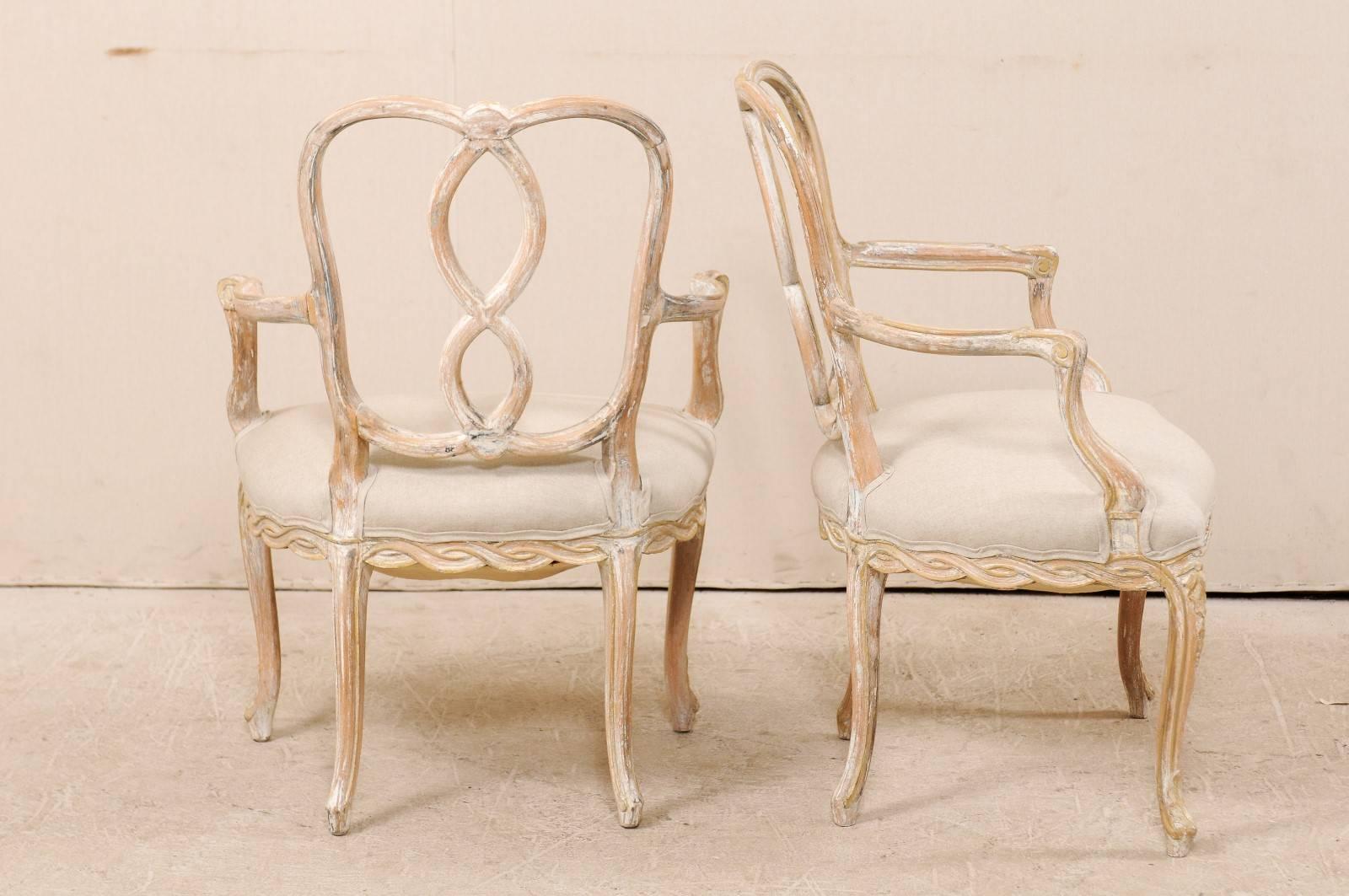 Carved Pair of Venetian Style Ribbon Back Chairs with Cabriole Legs in Nice Light Tones