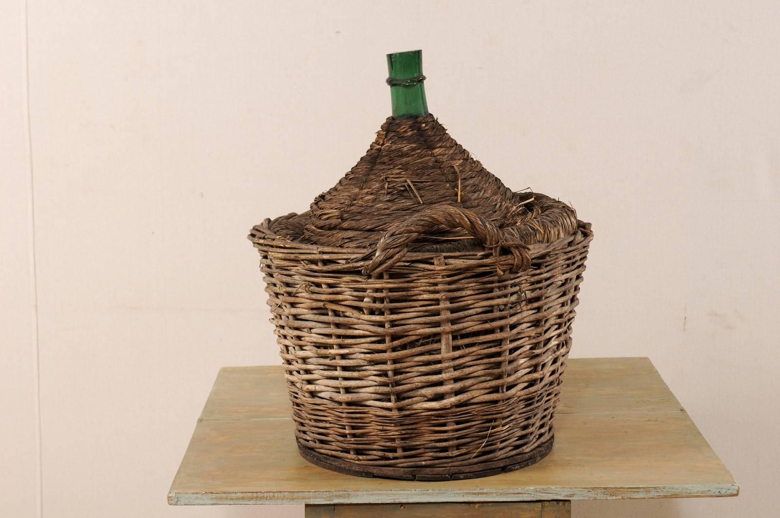 French Mid-Century Handwoven Basket with a Large Demijohn Glass Wine Bottle In Good Condition In Atlanta, GA