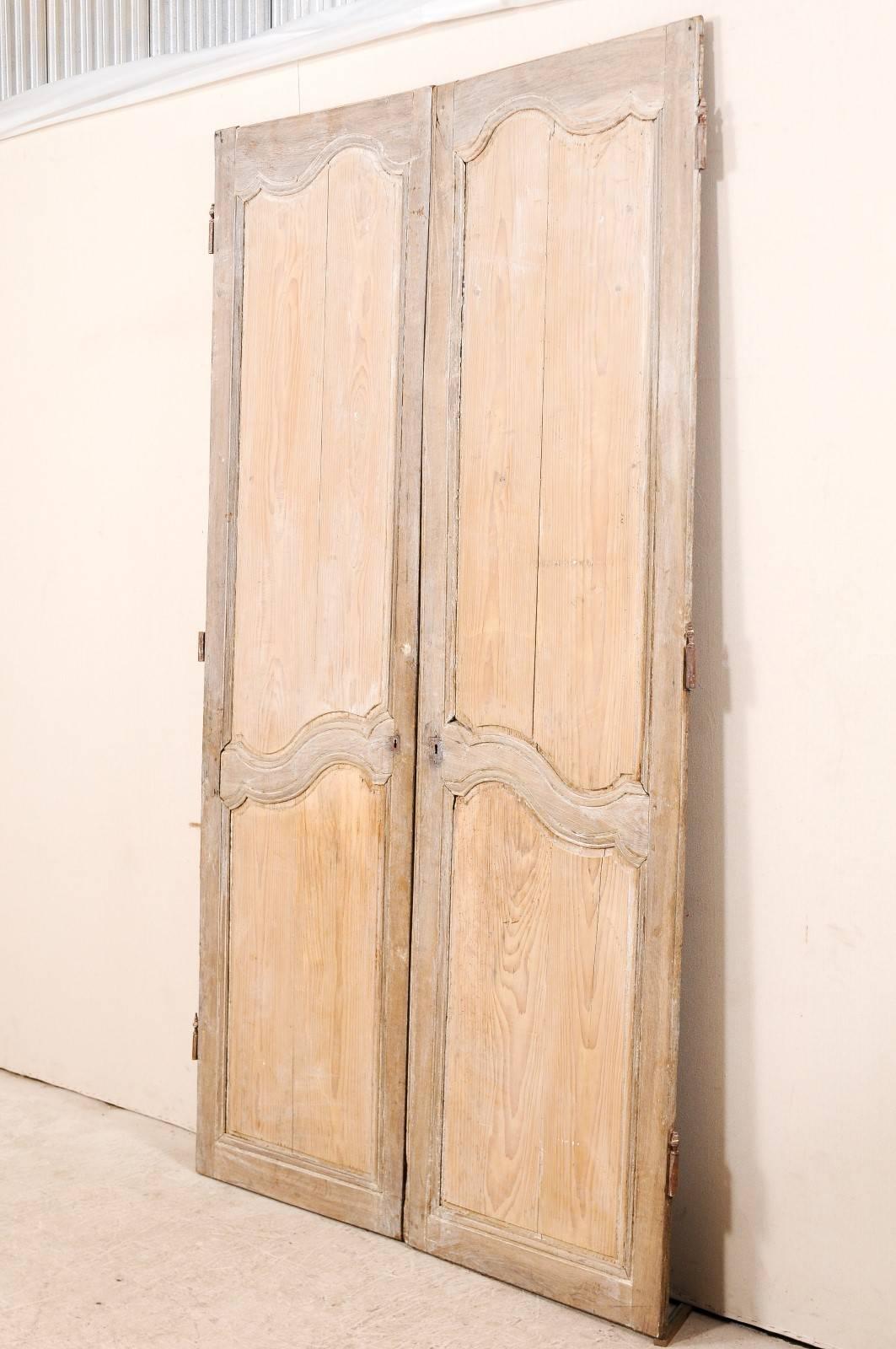 Carved Pair of 19th Century Tall French Doors with a Light Wash of Paint