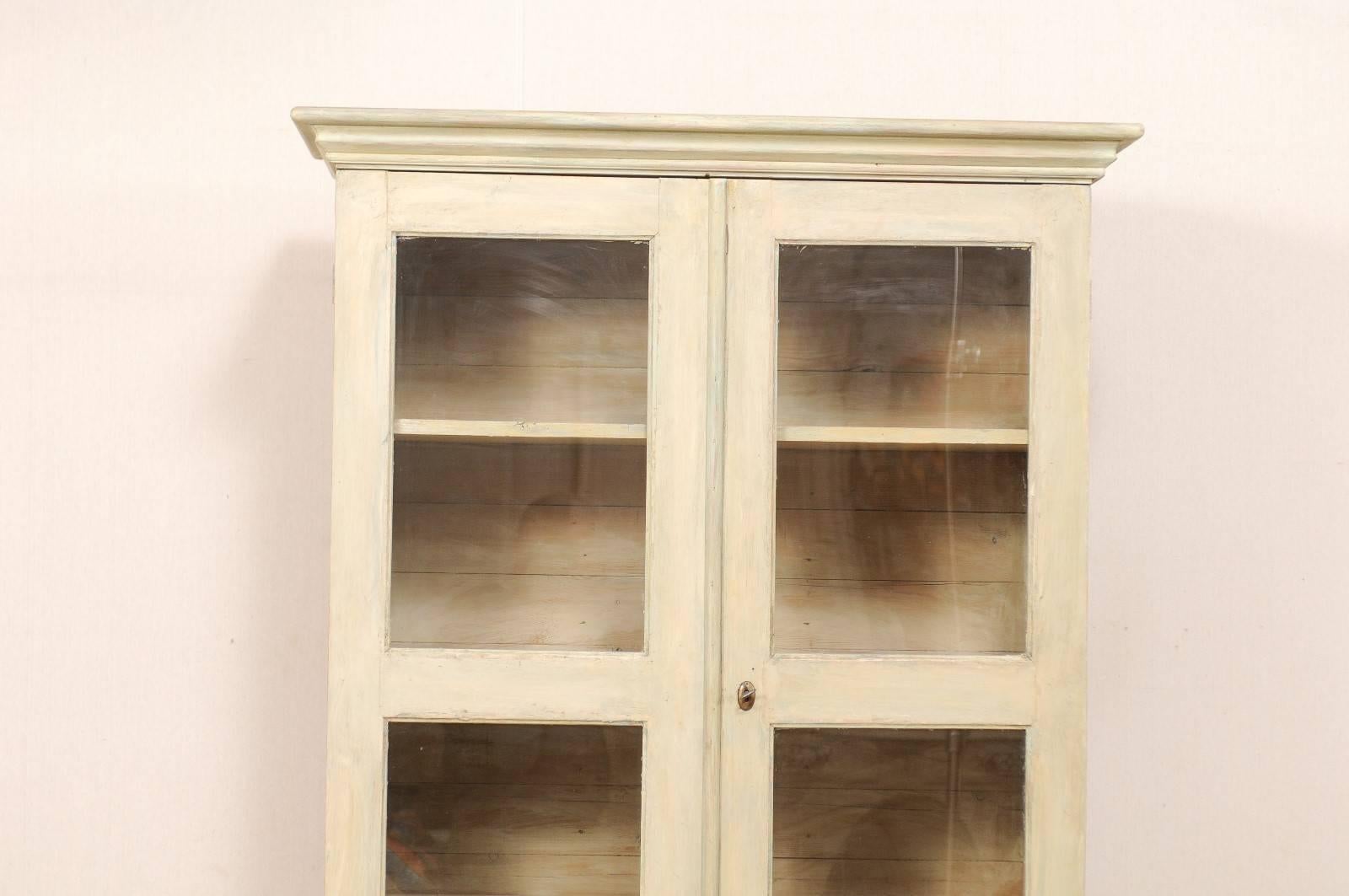 wood bookcase with glass doors