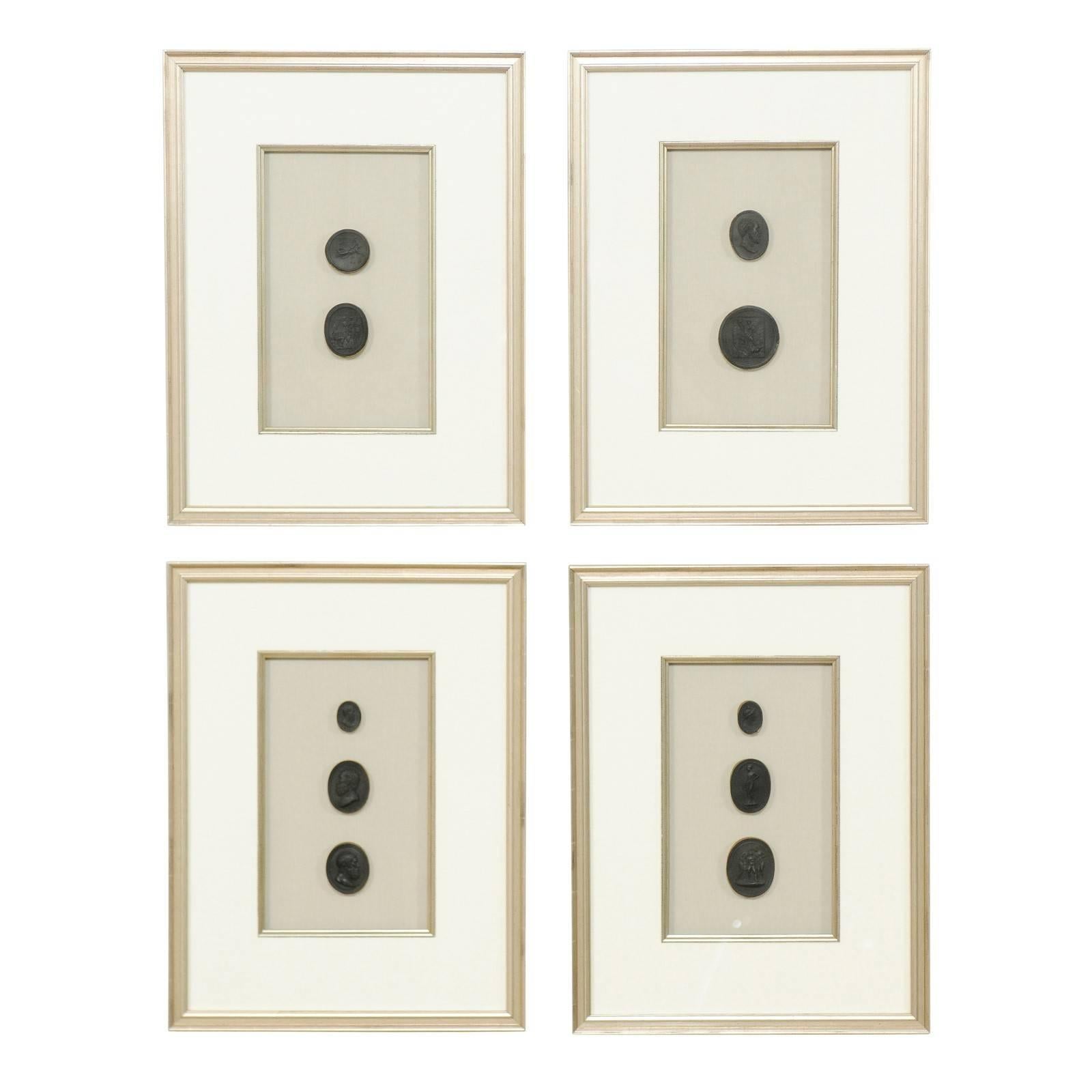 Set of Four Silver Framed and Matted Hand Cast Black Intaglio Wall