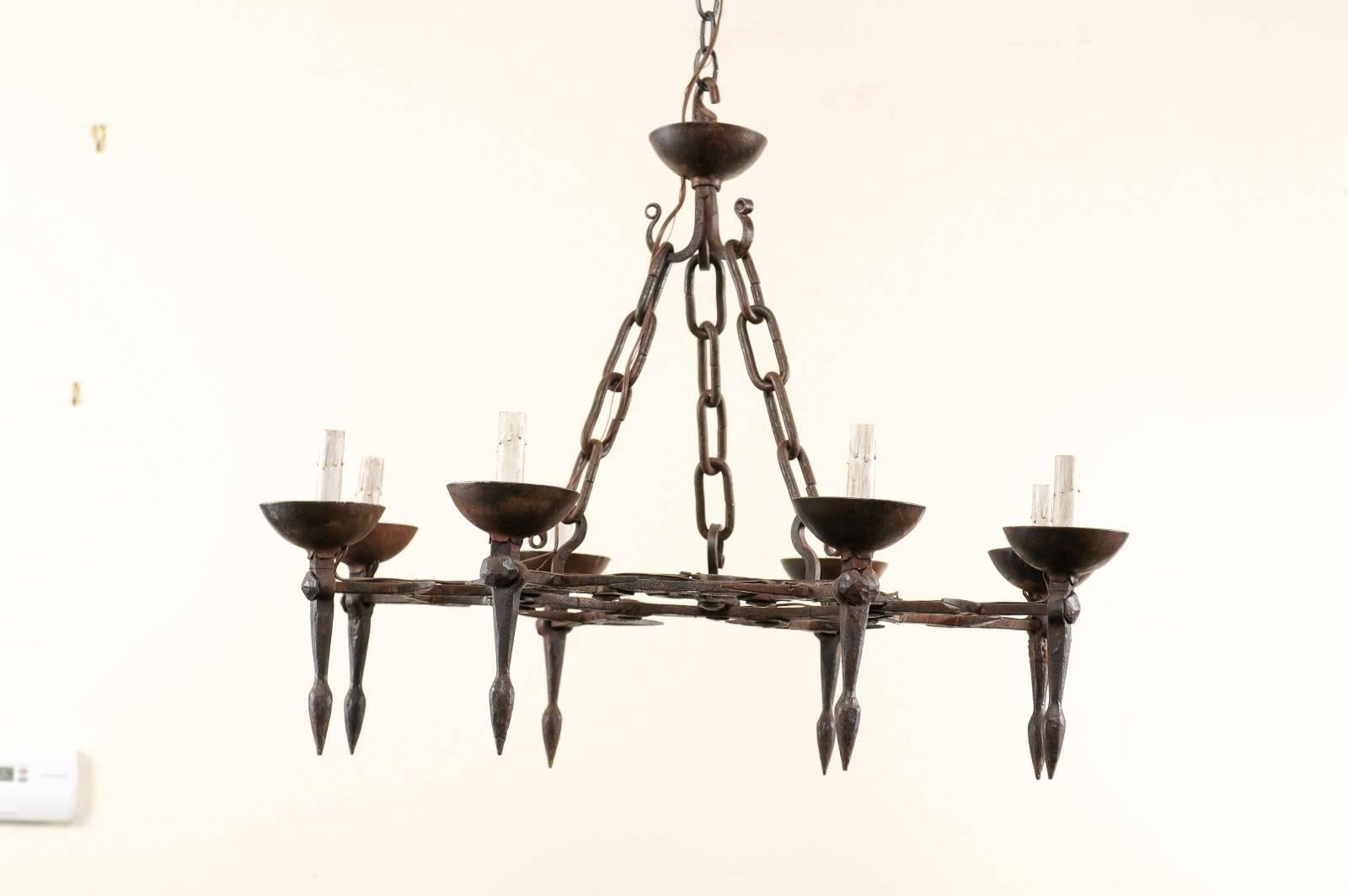 Rustic Vintage Round Iron Chandelier with Eight Torch Style Lights and Scroll Pattern