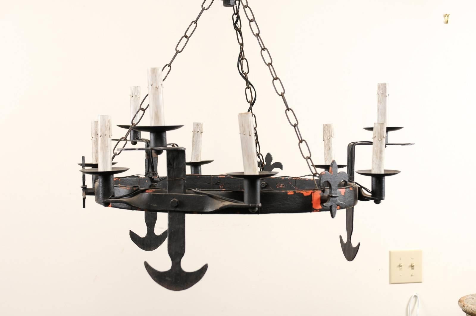 French Ring Shaped Iron Chandelier from the Mid-20th Century with Anchor Motifs In Good Condition For Sale In Atlanta, GA
