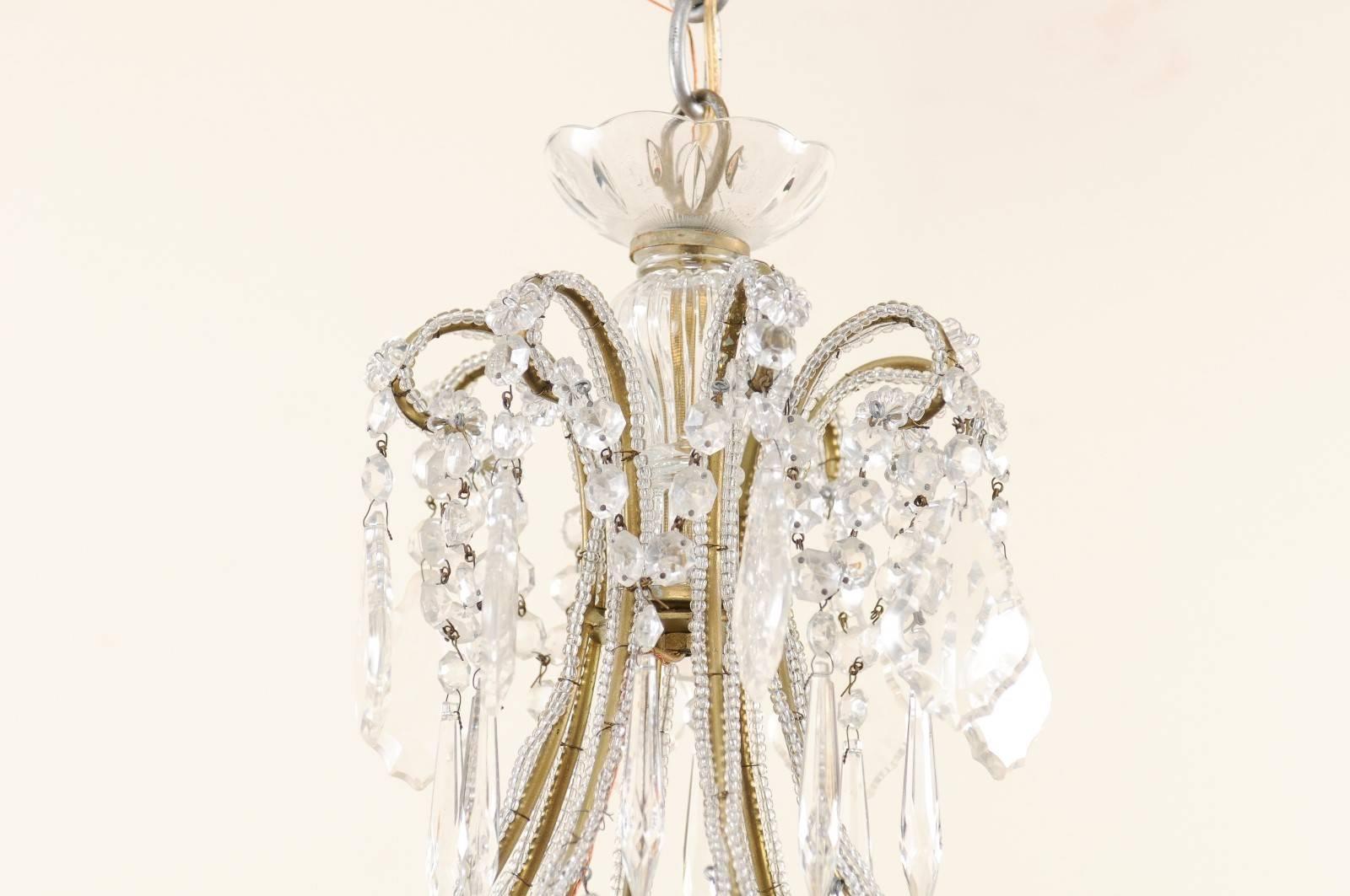 Gilt French Mid-20th Century Crystal Chandelier with Gilded and Beaded Armature