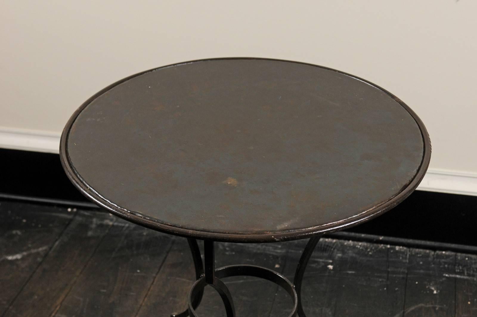 Pair of Petite Round Scrolling Steel Metal Bisto or Guéridon Tables In Good Condition In Atlanta, GA
