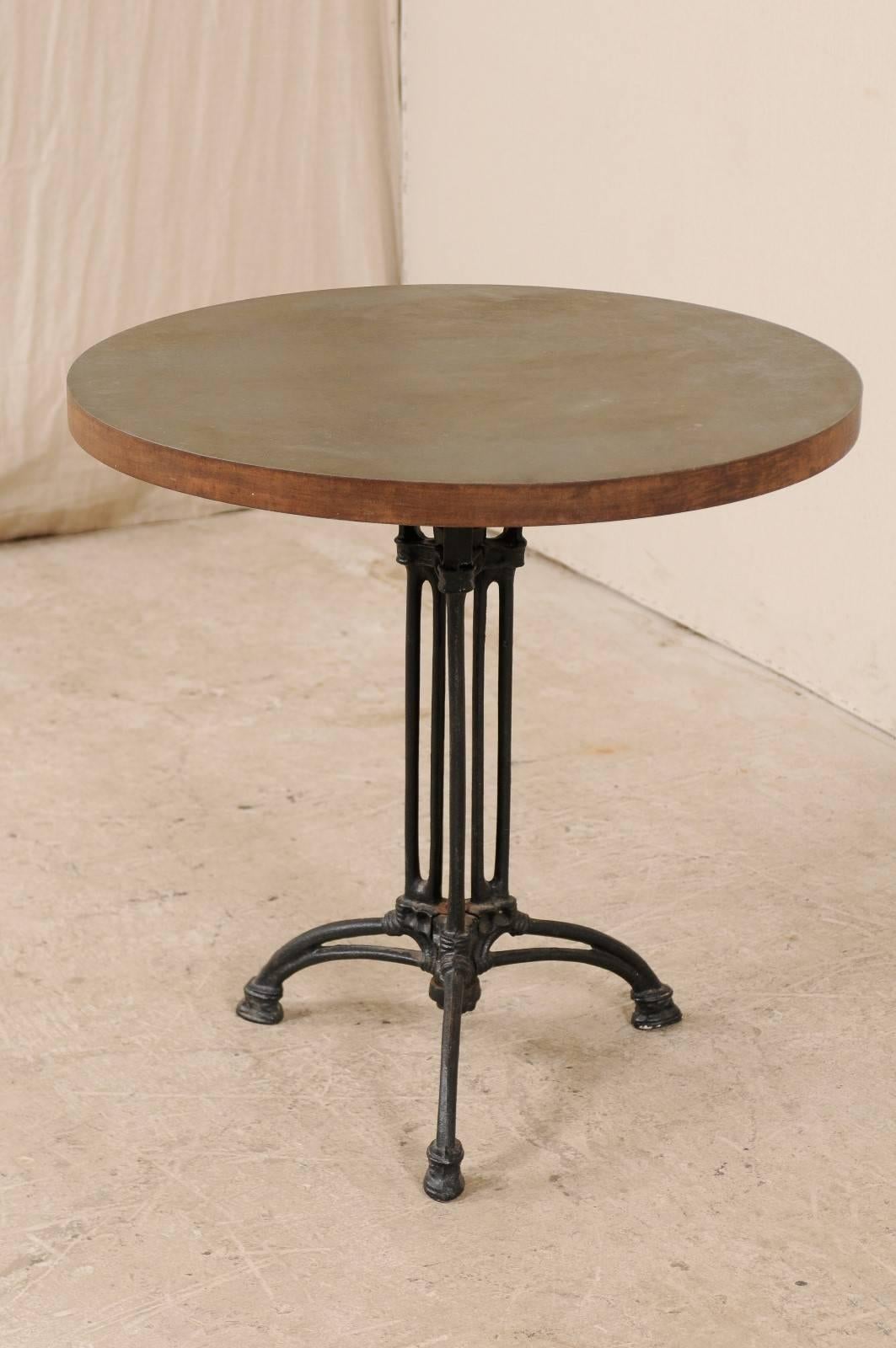 Patinated French Iron Bistro Table with Early 19th Century Iron Base, Indoor/Outdoor