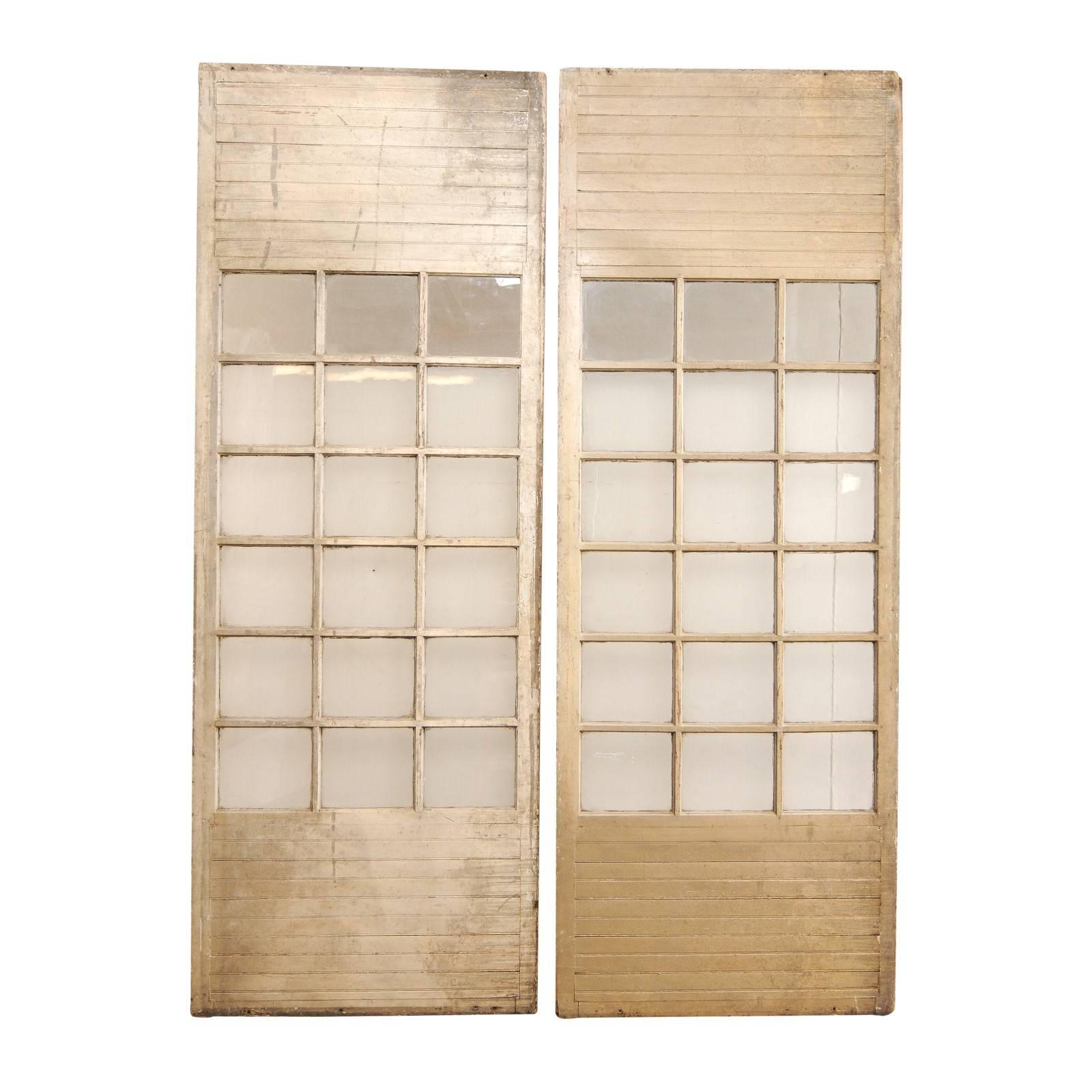 10 ft+ Tall French Pair of Glass Paneled Wood Doors from the Early 20th C. For Sale