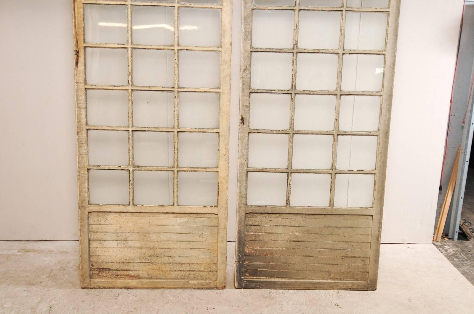 10 ft+ Tall French Pair of Glass Paneled Wood Doors from the Early 20th C. For Sale 2