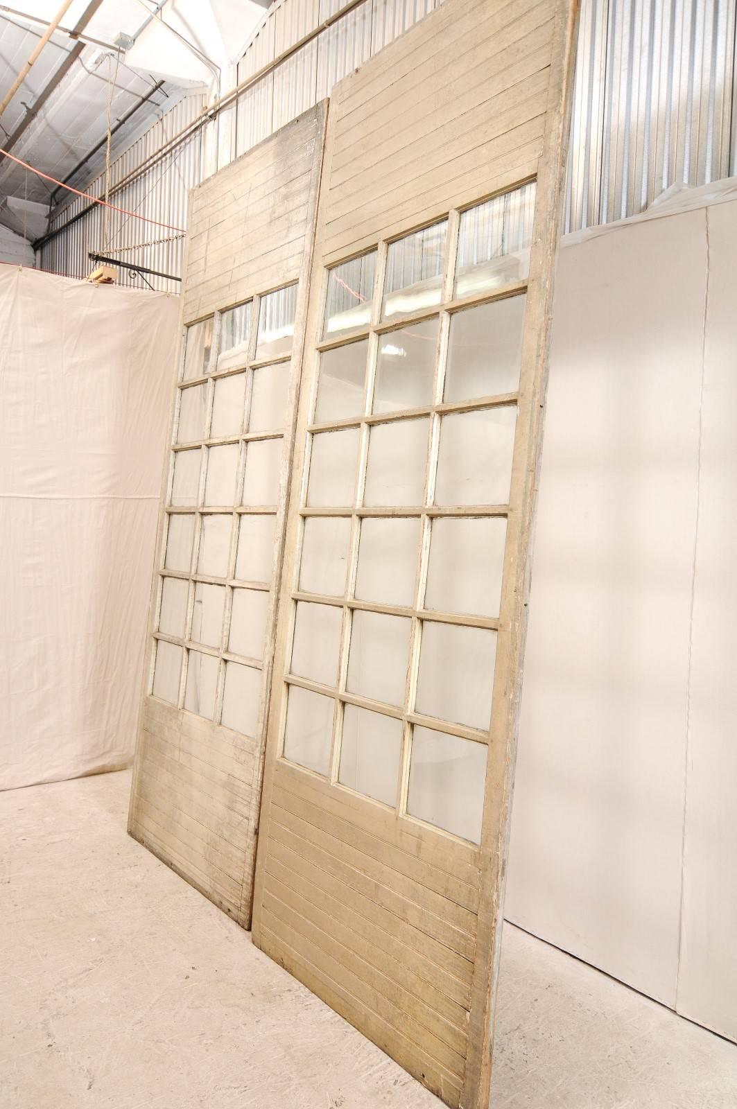20th Century 10 ft+ Tall French Pair of Glass Paneled Wood Doors from the Early 20th C. For Sale