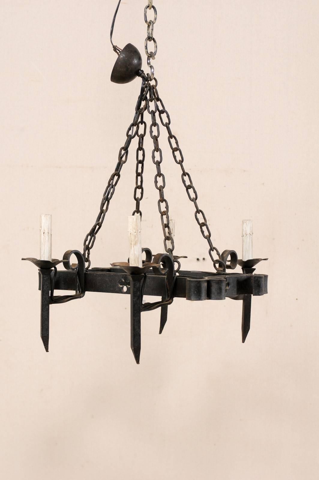 Vintage French Forged Iron Black Chandelier with Pierced Clover Motif Pattern In Good Condition For Sale In Atlanta, GA