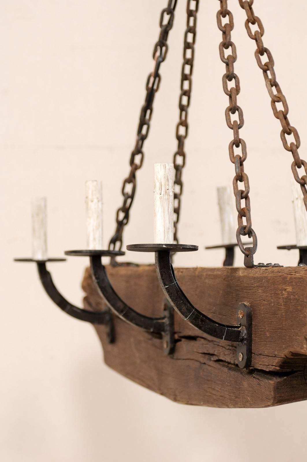 Metal French Rustic Wood Beam Chandelier with Six Forged Iron Arms, Mid 20th C. For Sale