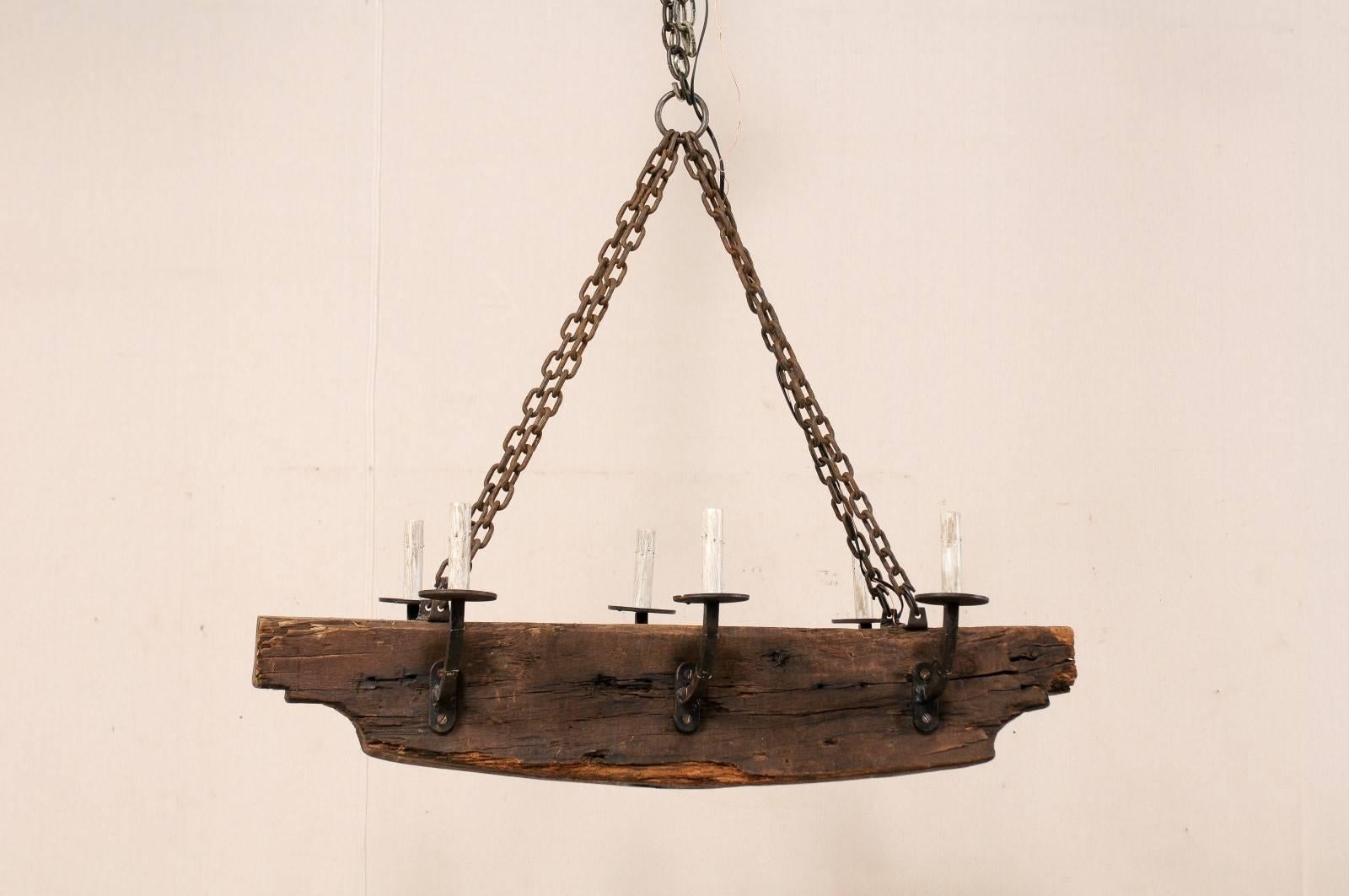 French Rustic Wood Beam Chandelier with Six Forged Iron Arms, Mid 20th C. In Good Condition For Sale In Atlanta, GA