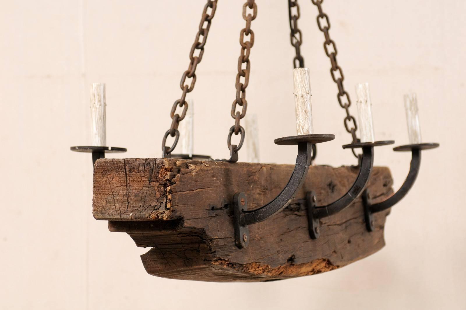 French Rustic Wood Beam Chandelier with Six Forged Iron Arms, Mid 20th C. For Sale 1