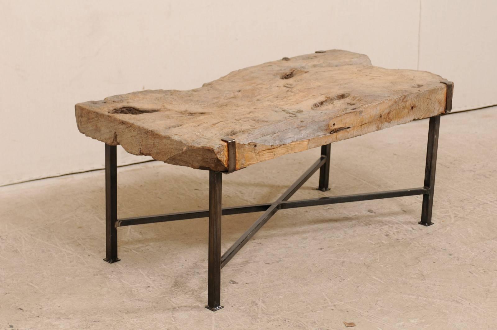 Carved Spanish 19th Century Rustic Wood Slab Coffee Table with Custom Black Iron Base