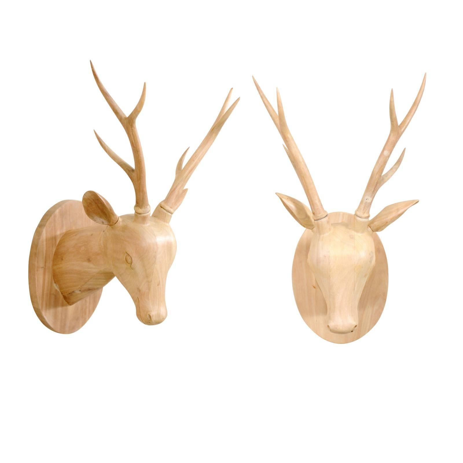 Pair of Carved and Bleached Wood Deer Heads with Oval Back-Plates