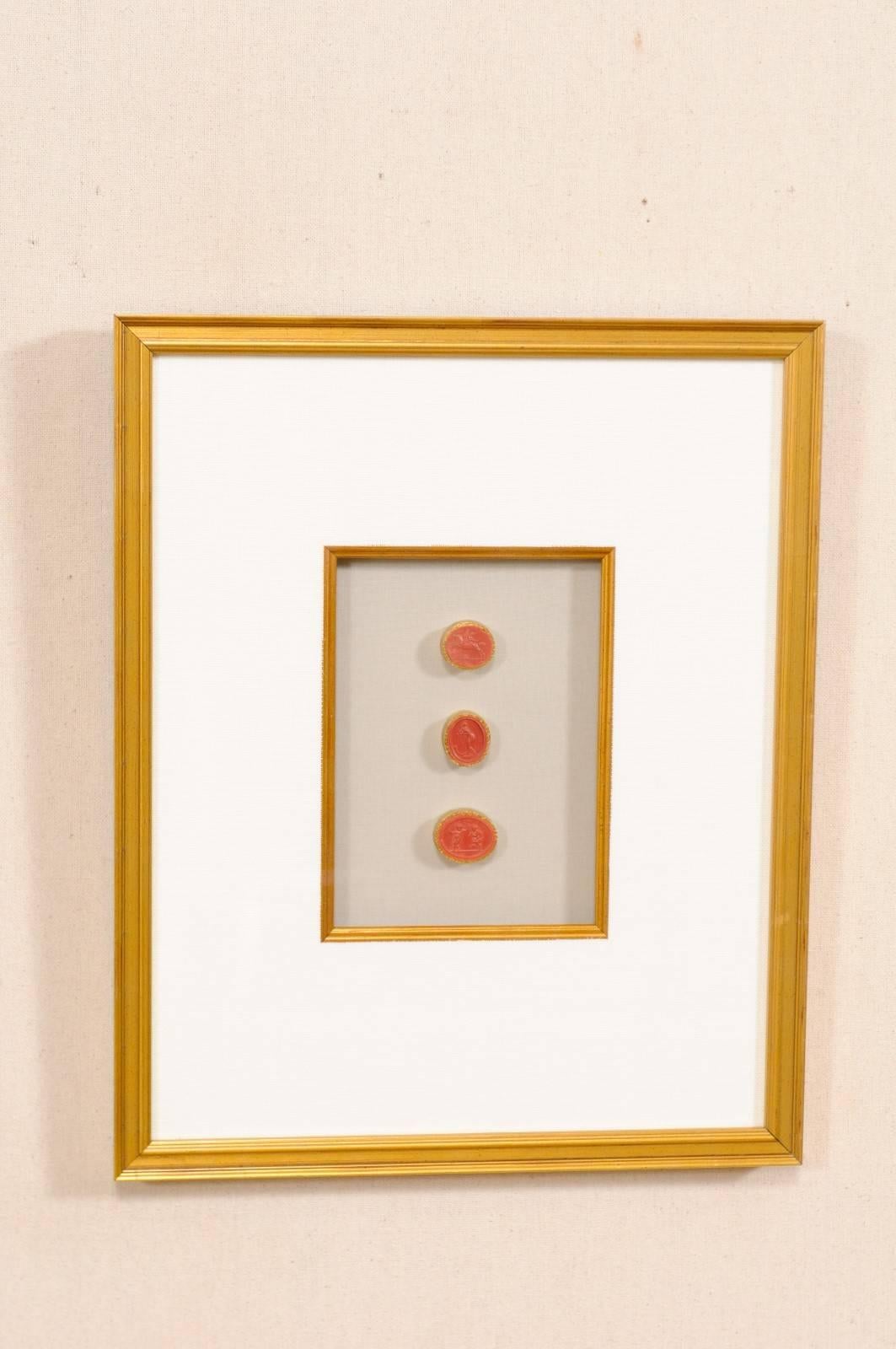 Rare Italian Red Intaglios Mounted in a Pair of Painted Gold Frames In Good Condition In Atlanta, GA