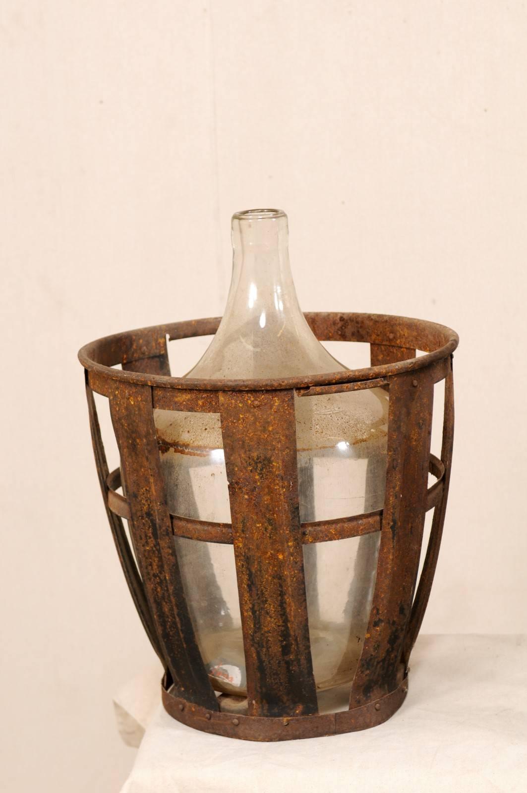 Glass Pair of French Mid-20th Century Vintner Iron Baskets with Demijohn Wine Bottles