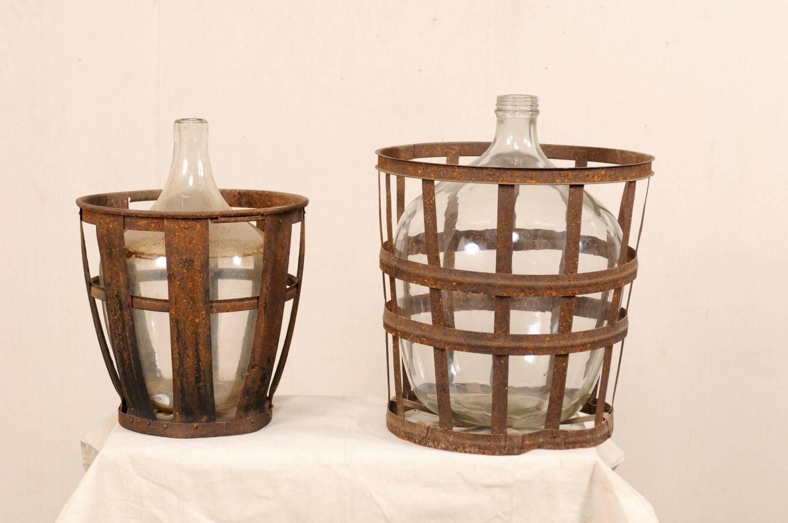 Pair of French Mid-20th Century Vintner Iron Baskets with Demijohn Wine Bottles 2