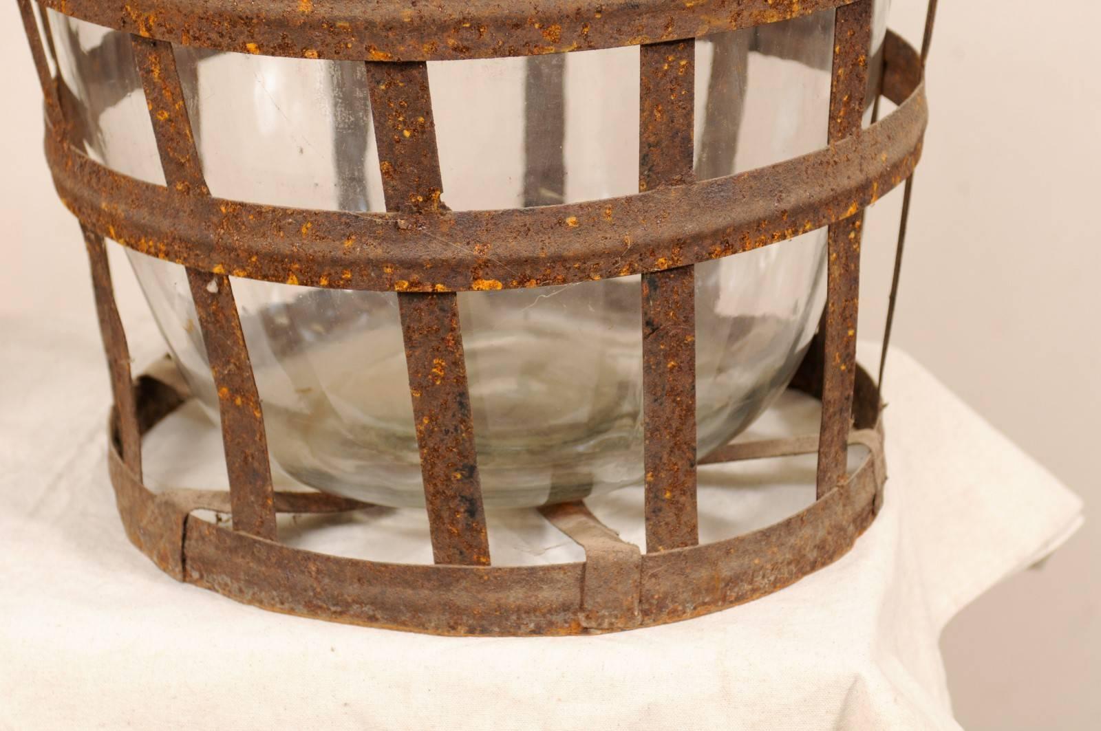 Pair of French Mid-20th Century Vintner Iron Baskets with Demijohn Wine Bottles 3