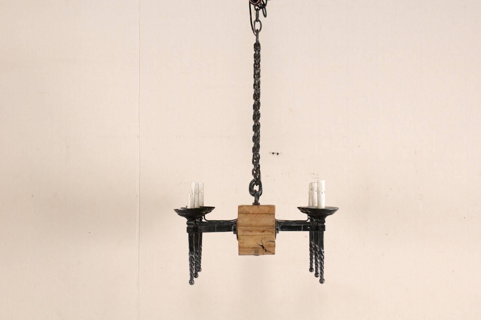 French Vintage Six-Light Wood and Ornate Iron Chandelier with Torch Style Arms For Sale 1