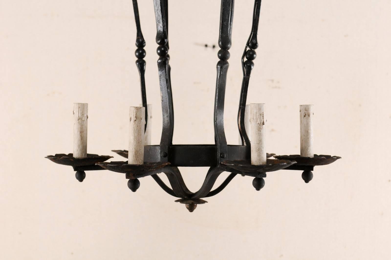 An Elegant French Six Light Scrolling Black Forged-Iron Chandelier, Rewired For Sale 1