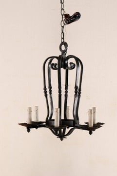 An Elegant French Six Light Scrolling Black Forged-Iron Chandelier, Rewired