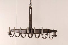 French Linear 12-Light Iron Chandelier with Swag Arms, Mid 20th Century
