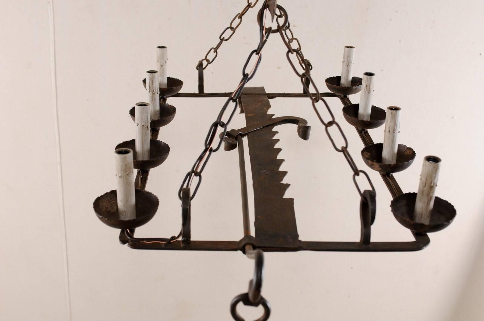 French Mid-20th Century Eight-Light Forged Iron Chandelier Made from a Spit-Jack 3