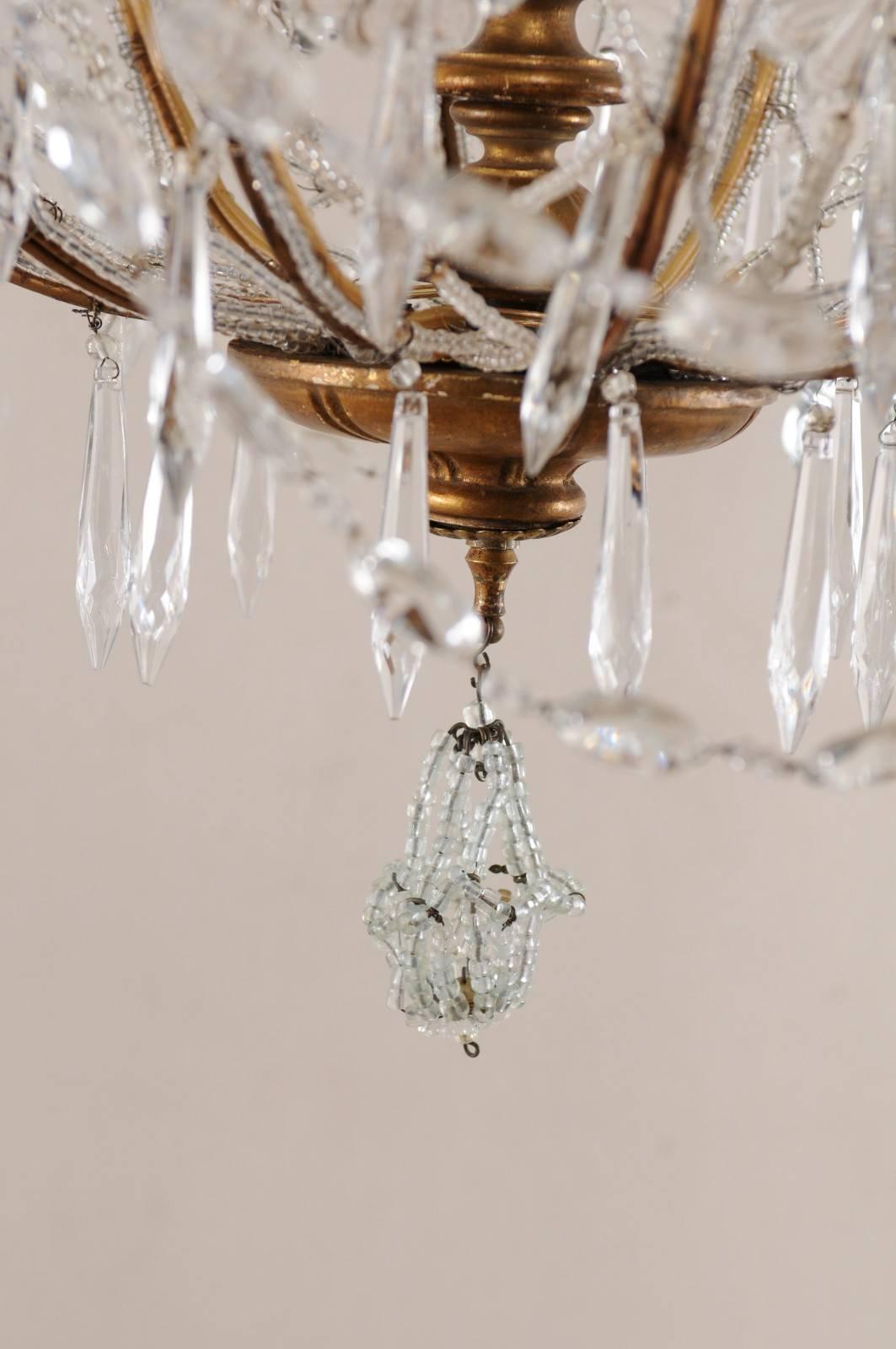 Italian Basket Shaped Elegant Crystal Chandelier with Carved and Gilded Column 2