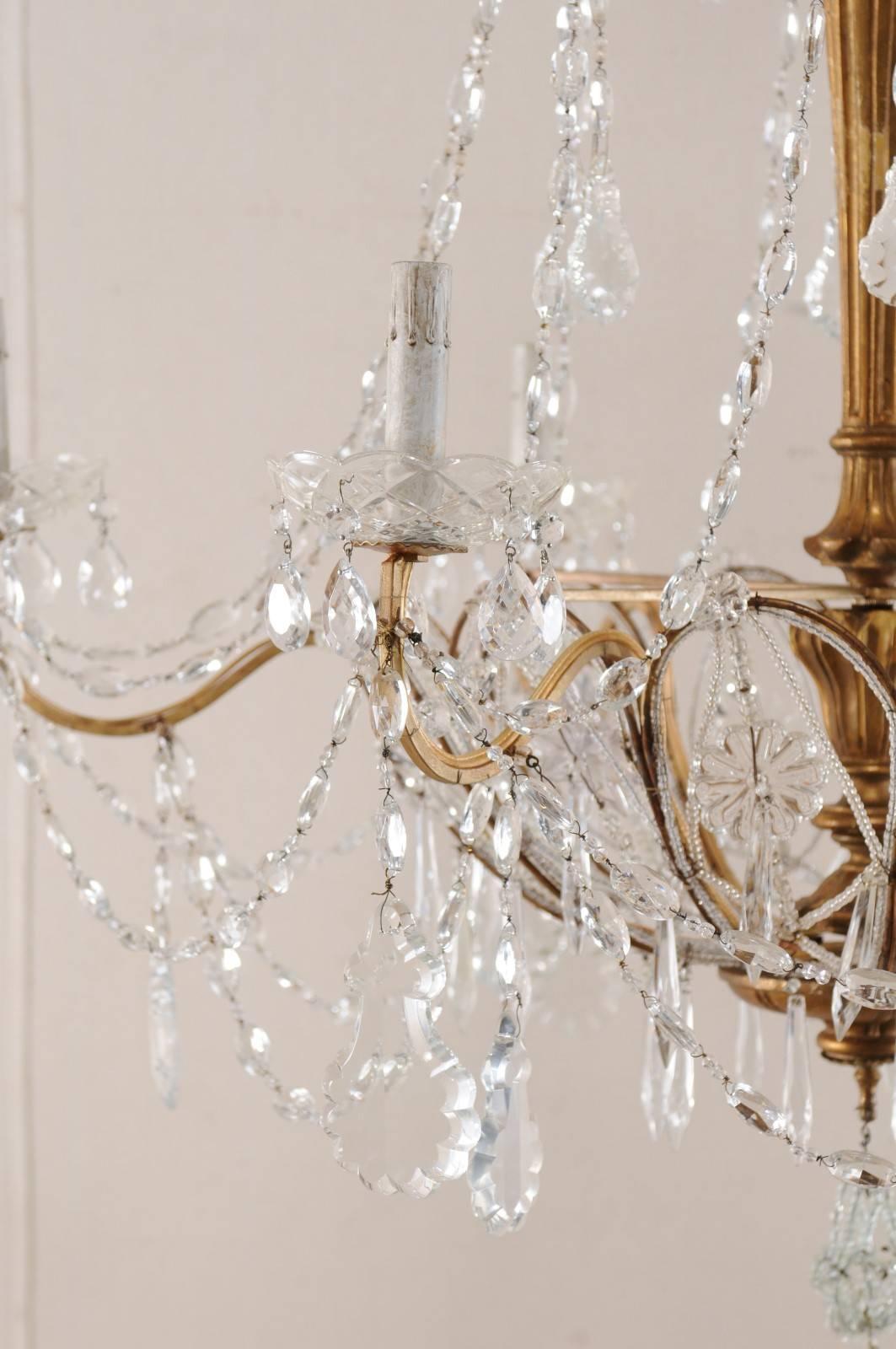Italian Basket Shaped Elegant Crystal Chandelier with Carved and Gilded Column 1
