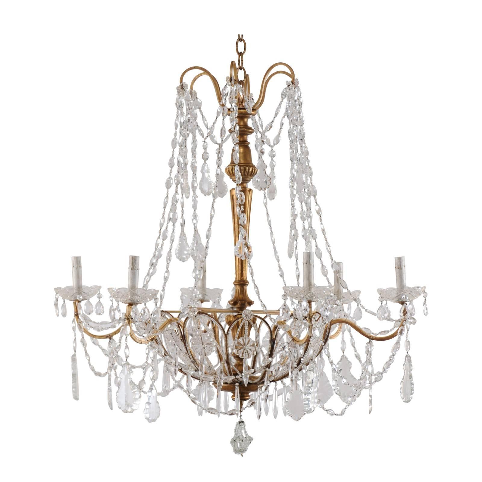 Italian Basket Shaped Elegant Crystal Chandelier with Carved and Gilded Column