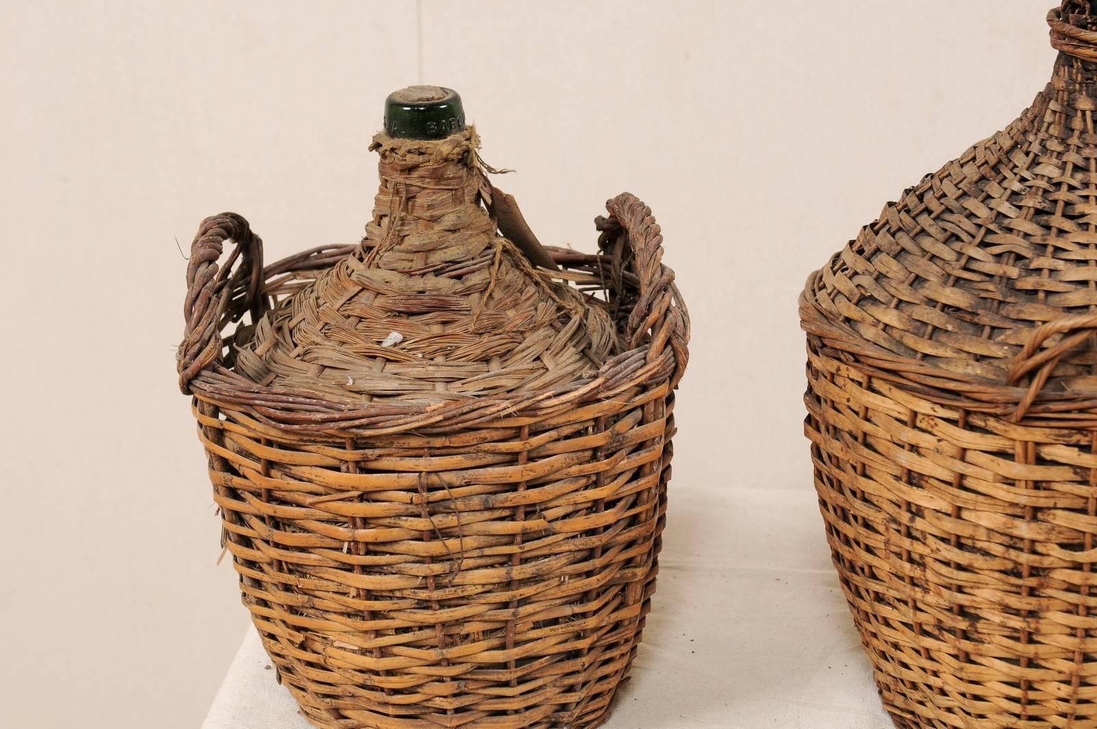 20th Century Set of Three French Midcentury Vintner Woven Baskets with Demijohn Wine Bottles For Sale