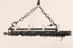 French Eight-Light Forged Iron Chandelier Made from a 19th Century Spit-Jack