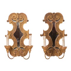 Pair of Italian Two-Light Sconces of Scrolled Giltwood with Mirrored Back-Plate