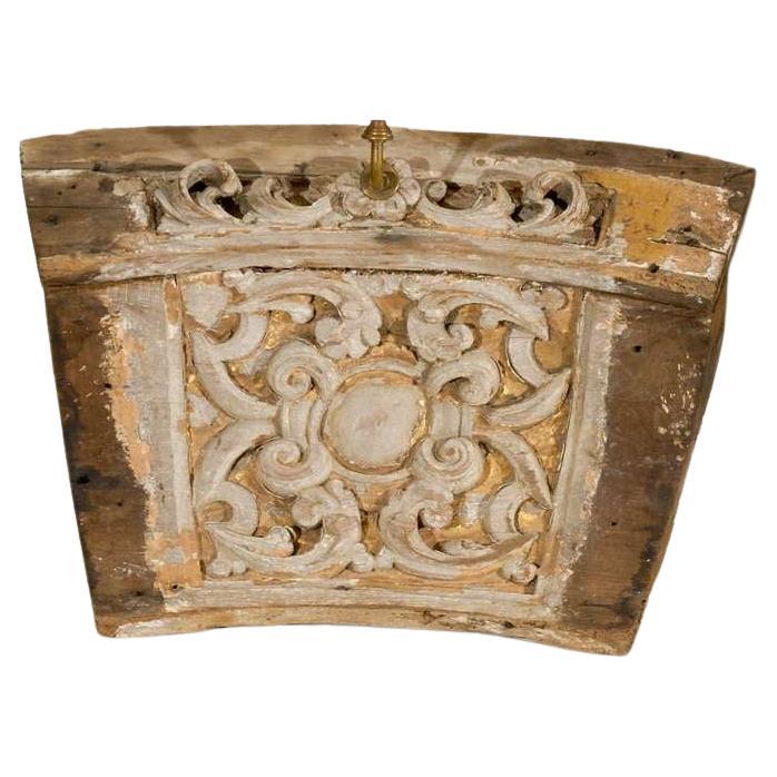 A single 19th century Italian wooden fragment made into a sconce with traces of gilding, paint and delicate carving. Very nice rustic yet quite elegant finish. The shades on the picture are an additional $150 each. If you are interested in the