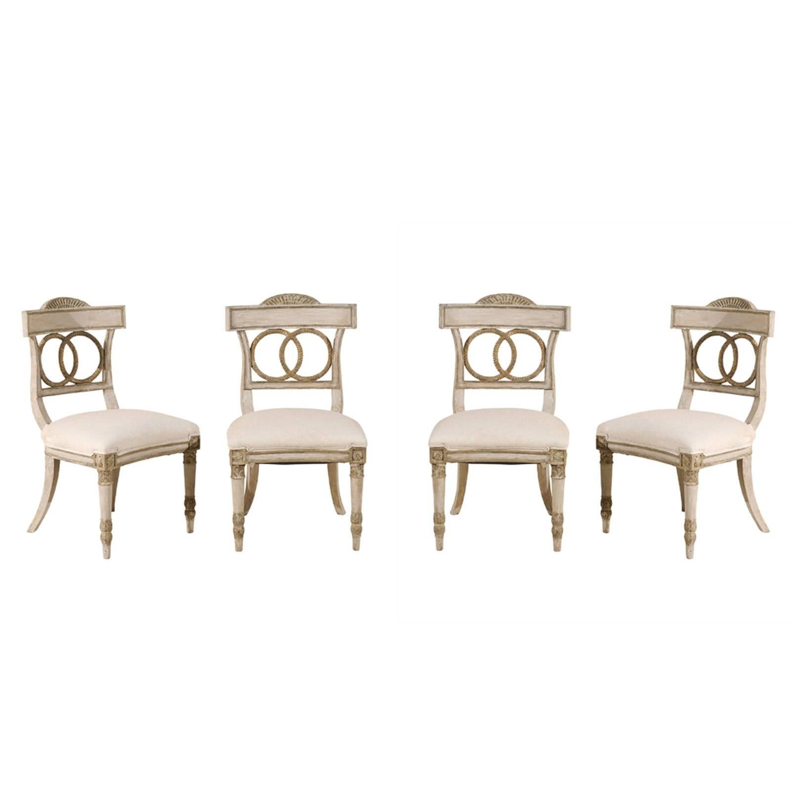 Set of Four European Painted Wood Chairs