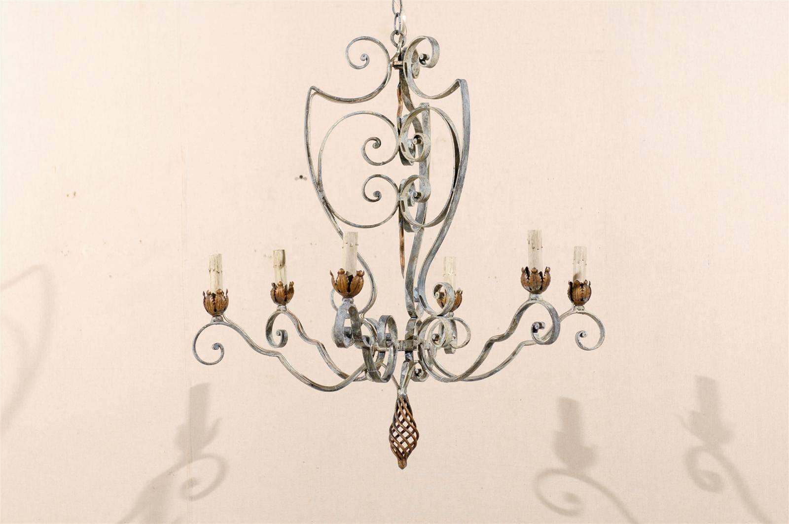 A French vintage painted iron six-light chandelier with flower shaped bobeches from the mid-20th century.

This painted iron chandelier has been rewired for the US market and comes with a complimentary 3 foot chain and canopy painted to match.