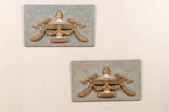 A Pair of Italian 19th C. Painted Wood Wall Plaques with Carved Urns