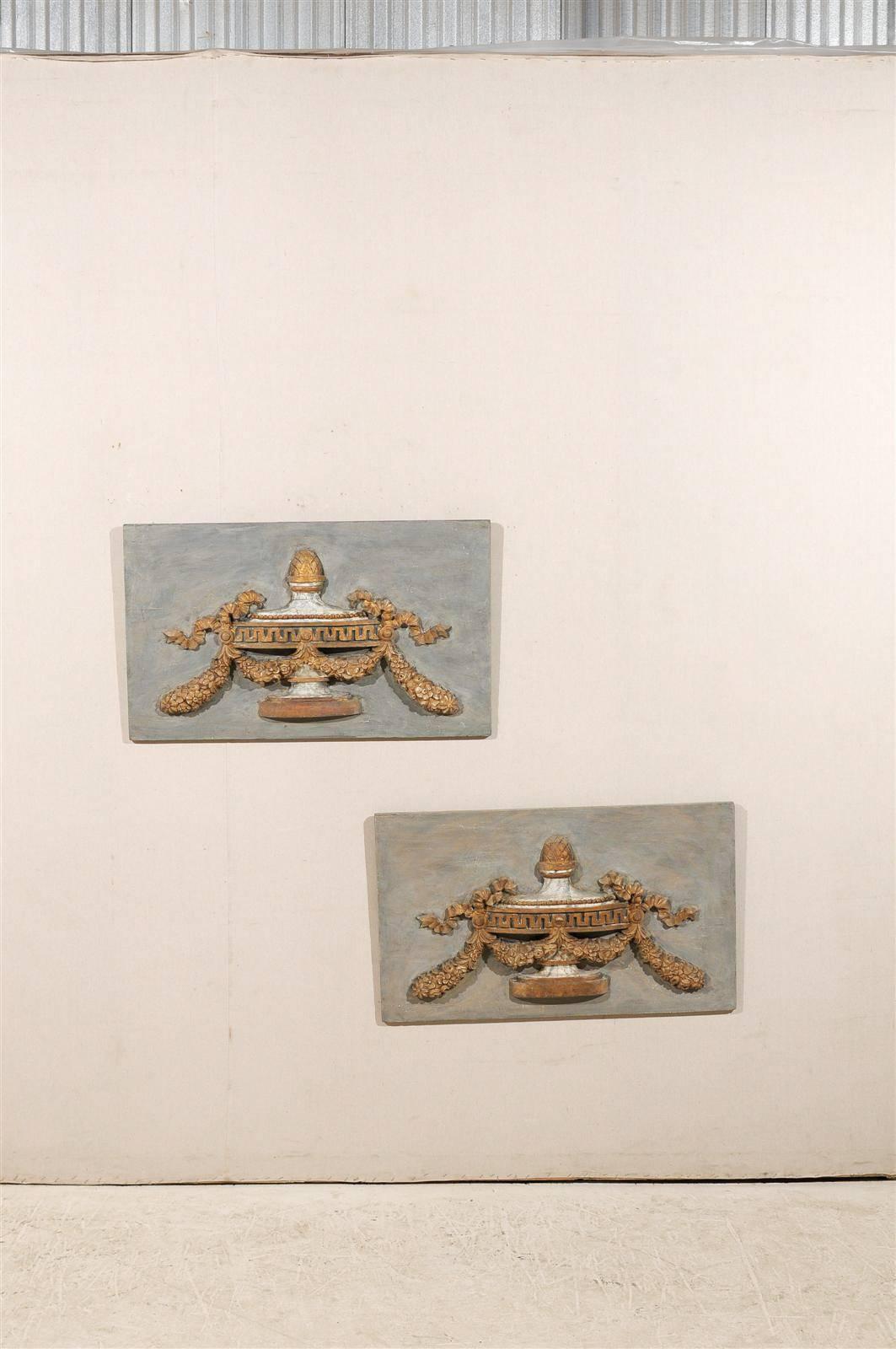 Gilt A Pair of Italian 19th C. Painted Wood Wall Plaques with Carved Urns For Sale