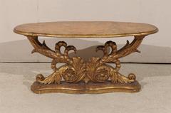 An Italian Mid 19th Century Giltwood Oval Coffee Table with Faux Marble Top