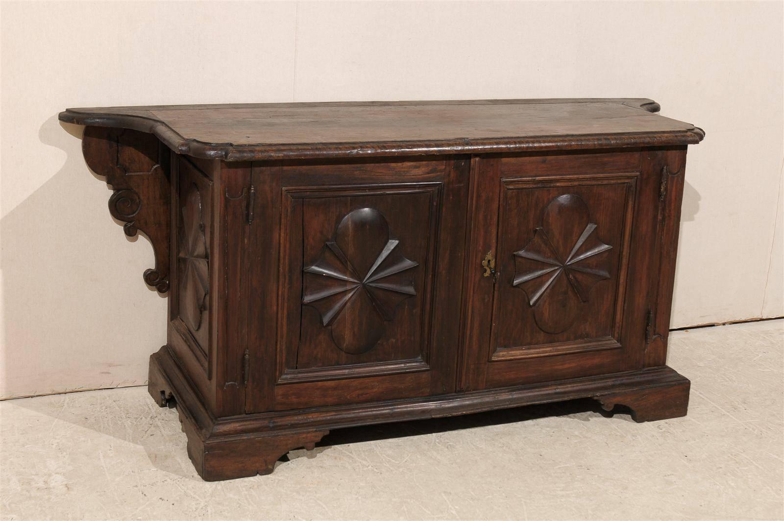 18th Century and Earlier 18th Century Italian Rich Walnut Wood Credenza with Sunburst and Volute Motifs