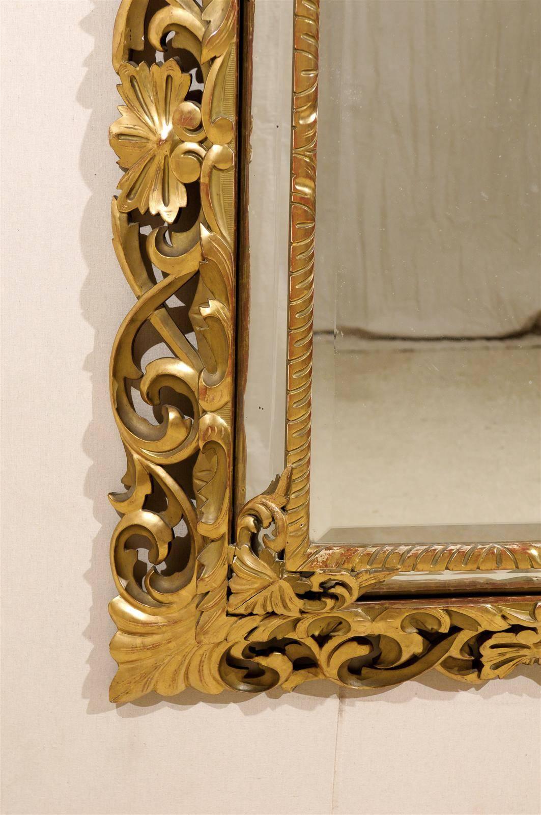 Giltwood An Italian 19th Century Gilt Wood Mirror with Ornate Foliage Decor, Gold Color For Sale