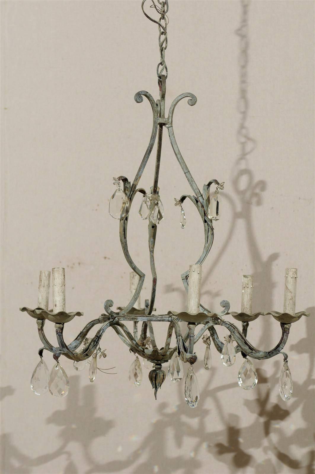 20th Century A Pair of French Painted Iron and Crystal Six-Light Chandeliers with Leaf Motifs