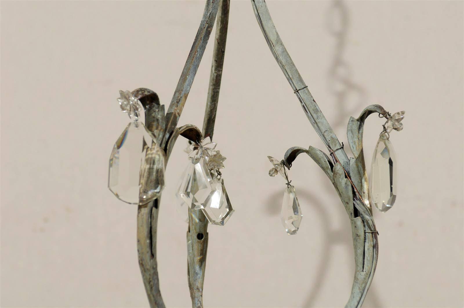 A Pair of French Painted Iron and Crystal Six-Light Chandeliers with Leaf Motifs 2