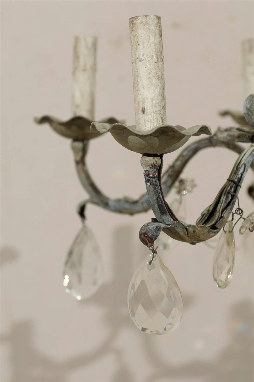 A Pair of French Painted Iron and Crystal Six-Light Chandeliers with Leaf Motifs 3