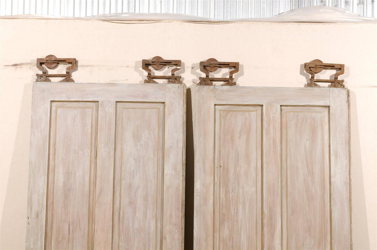 Pair of Early 20th C. Painted Wood 5-Panel Pocket Doors, with Original Hardware For Sale 1