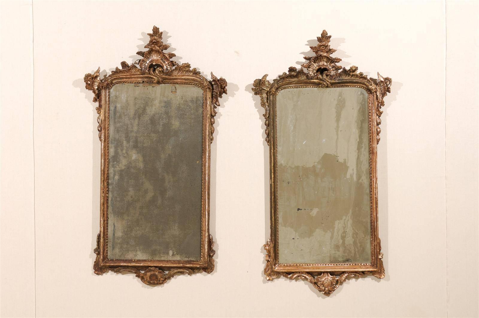 Carved Pair of 18th Century Italian Mirrors in Rococo Style with Nicely Aged Gold Color