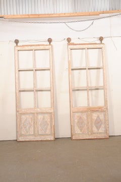 Pair of Tall Antique French Glass & Wood Panel Doors with Rollers at Top