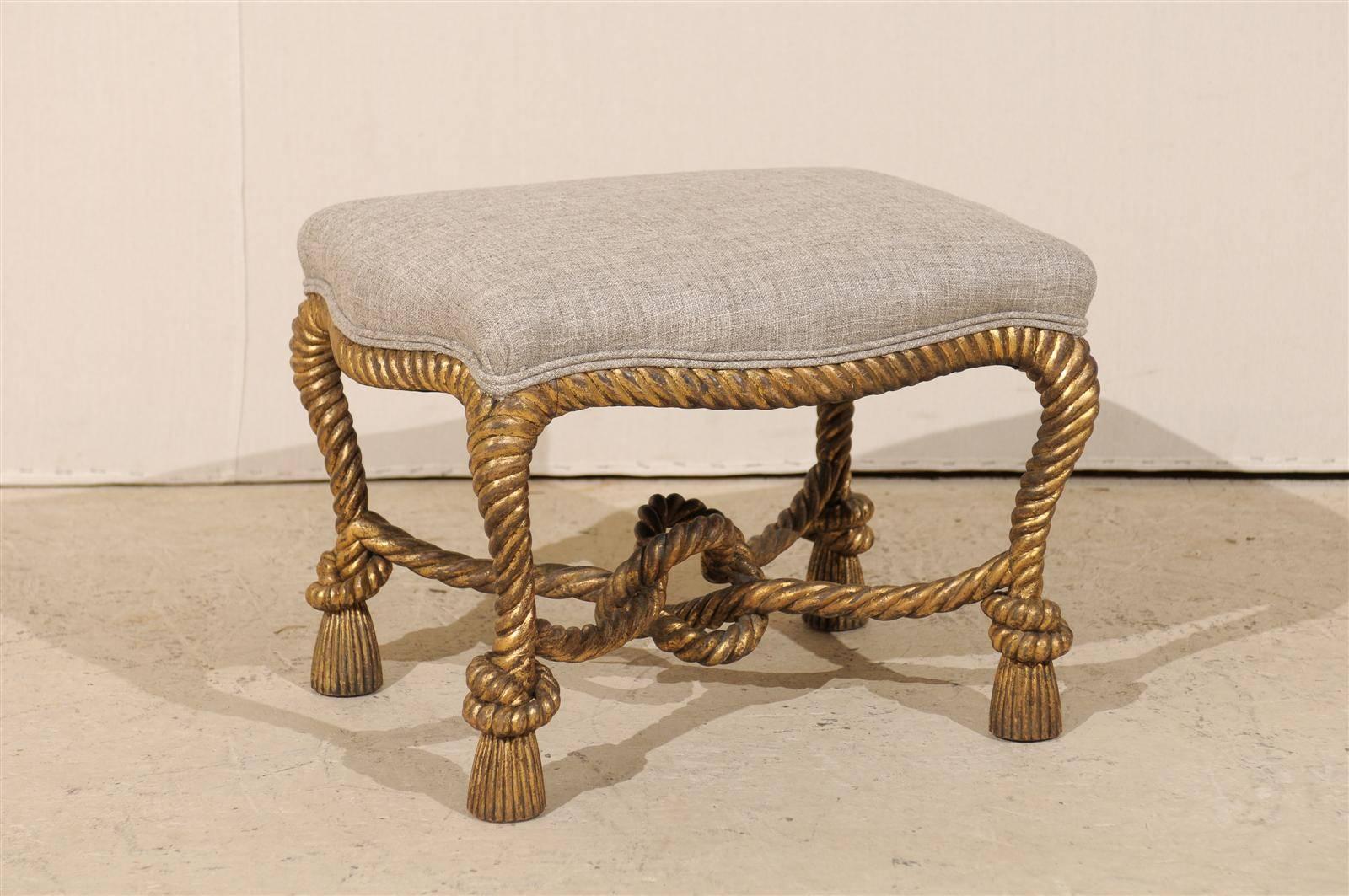 An Italian carved and giltwood stool. This stool has elegant 