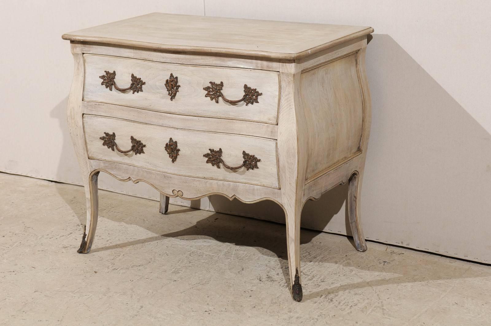 Carved Antique French Bombé Shaped Two-Drawer Chest Raised on Sabre Legs